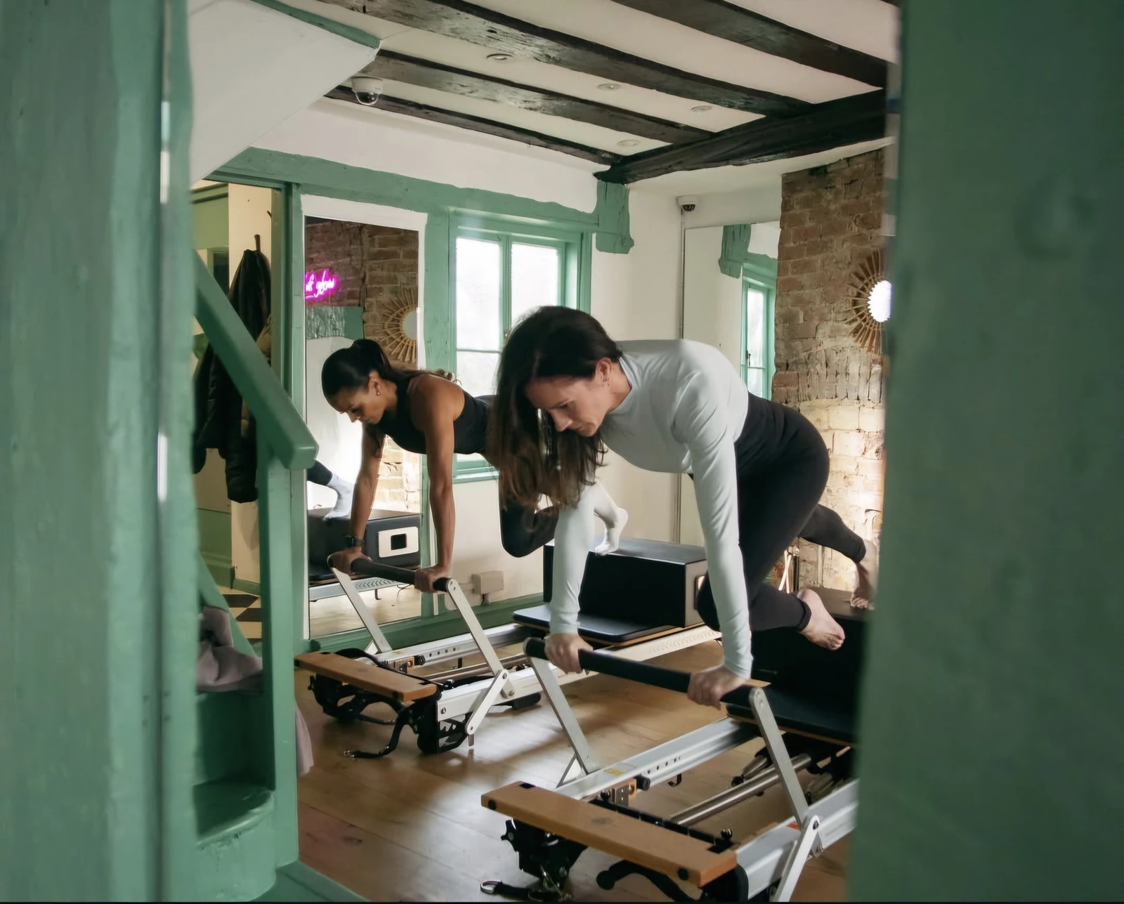 The Pines Studio interior with reformer equipment and green features